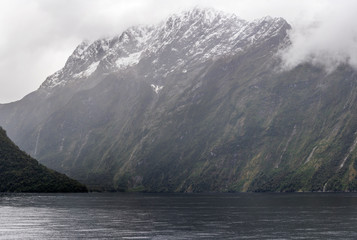 steep rocky slopes at fjord shores,  Milford Sound, New Zealand