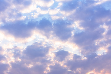 Blue sky with fluffy white clouds texture.
