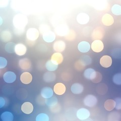 Obraz premium Bokeh pattern on shiny blue defocus background. Festive abstract illustration.