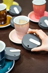 Reduce takeaway coffee cup waste with reusable ceramic coffee cups! Zero waste. Sustainable lifestyle background concept.