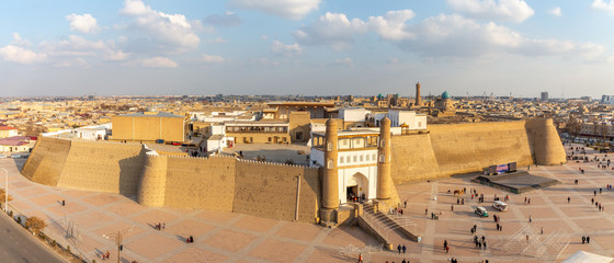 Panorama of  Bukhara city (Ark fortress, POI Kalyan architectural complex). Bukhara city, Uzbekistan - obrazy, fototapety, plakaty