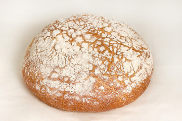 White round bread range of bakery and bread products. Closeup on a light background