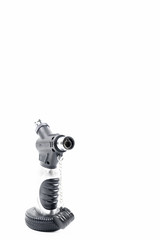 Gas lighters on a flat surface on a white background