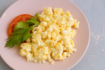 scrambled eggs on  plate. the view from the top.