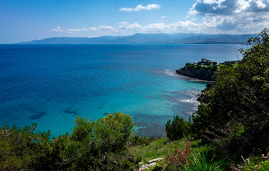 Fototapeta na wymiar Green mountainous coast of the Mediterranean Sea on the Akamas Peninsula in the northwest of the island of Cyprus.