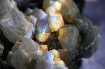 Amazing natural light reflections on healing Smokey Quartz wild jewels. Texture of gemstone with...