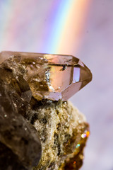 Amazing natural light reflections on healing Smokey Quartz wild jewels. Texture of gemstone with...