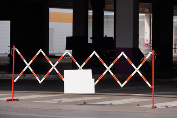 Parking is closed before cancel restriction. Pandemic or epidemic coronavirus. Closed shops and malls, fence. Strict rules for people during quarantine