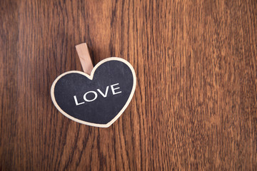 love text on  heart chalkboard