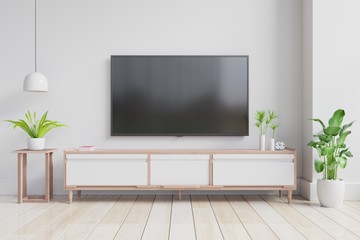 TV on the cabinet in modern living room on white wall background. - obrazy, fototapety, plakaty