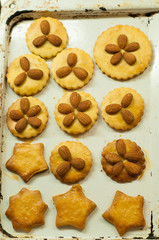 Cooking gluten free maize and rice flour cookies with almond