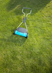 Fototapeta premium Above view of hand held lawn mower (lawnmower)