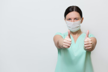Cavid-19 coronavirus and the concept of PM2 air pollution. 5.The girl wears a mask for protection. gives a thumbs up.Covid19 coronavirus and symptoms of an epidemic virus.Nurse