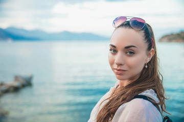 Beautiful woman posing on a background