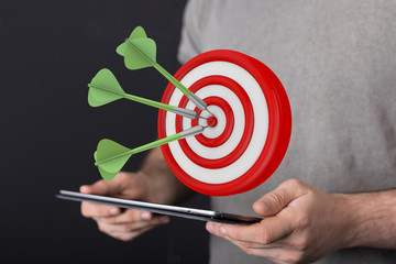 dart target arrow hitting on bullseye which is the ultimate goal that everyone wants.