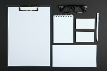 White stationery branding, stage layout on a soft colored background, empty objects to accommodate your design, inclined.
