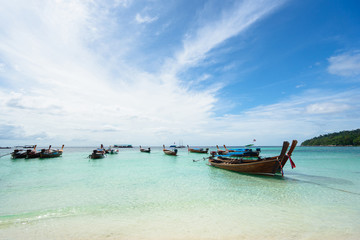 Fototapeta na wymiar Longtail boats and sea. Pattaya Beach, Koh Lipe, Thailand.