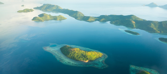 Fototapeta na wymiar Aerial view over beautiful Philippine islands and deserted beaches.