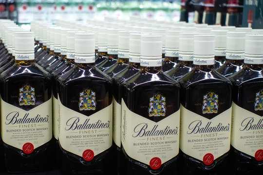 Tyumen, Russia - November 20, 2019: Bottles of Ballantine's best Scotch whisky Blended on store shelves for sale. Sale of alcoholic beverages in hypermarkets Metro