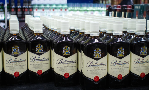 Tyumen, Russia - November 20, 2019: Ballantine's whisky bottles displayed for sale. Ballantine's is a range of Blended Scotch whiskies. Sale of alcoholic beverages in hypermarkets Metro