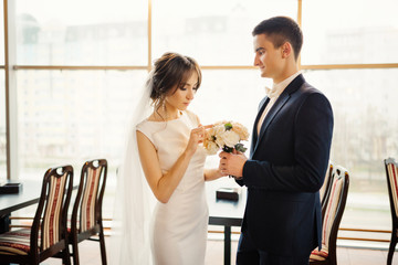 Elegant groom and beautiful bride at wedding day. Wedding, love, relationship concept.