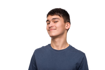 Shot of  smiling teenager boy wearing blue shirt, isolated