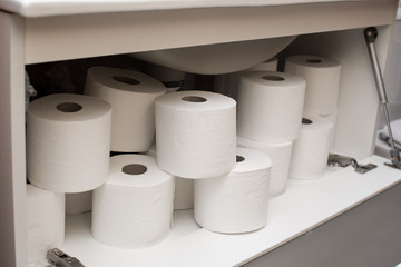 Paper rolls in bathroom furniture