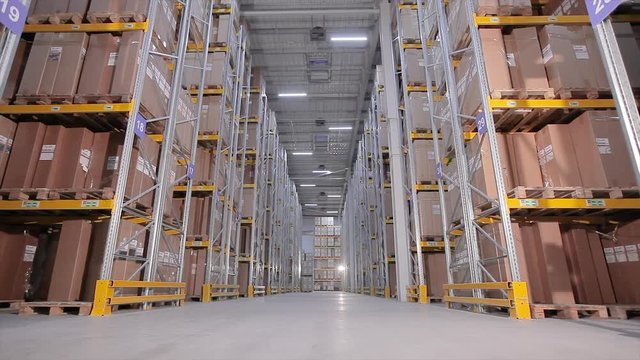 Timelapse warehouse, active work in the warehouse time laps, accelerated filming of the warehouse