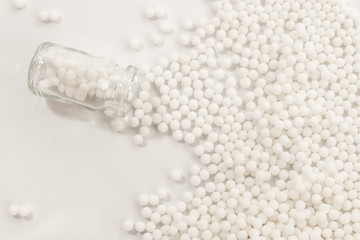 Homeopathy granules medicine isolated on a White Background
