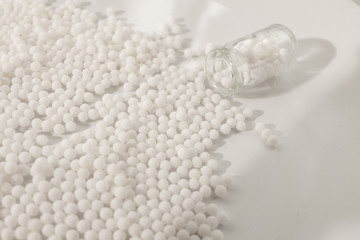 Homeopathy granules medicine isolated on a White Background
