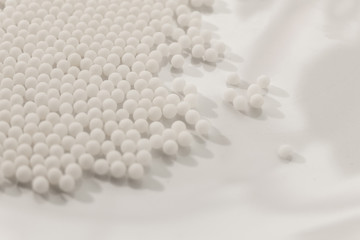 Homeopathy granules medicine isolated on a White Background