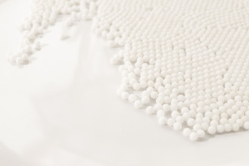 Homeopathy granules medicine isolated on a White Background