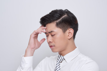 Young handsome business man wearing tie worried and stressed about a problem with hand on forehead, nervous and anxious for crisis