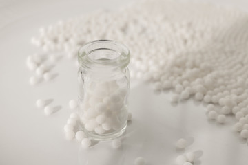 Homeopathy granules medicine isolated on a White Background