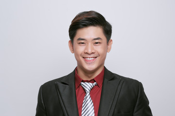 Closeup of happy smiling guy looking at camera isolated on white background