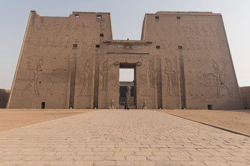 Naklejka premium Magnificent and ancient temple of Edfu, located on the western bank of the Nile River in Egypt, Africa, dedicated to the god of the Dioese Horus.