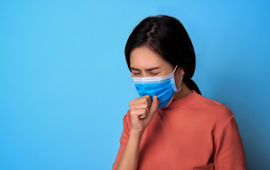 woman sneezing and covering mouth and nose while coughing flu. epidemic corona virus protection.