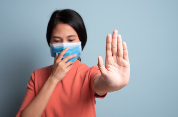 woman sneezing and covering mouth and nose while coughing flu. epidemic corona virus protection.