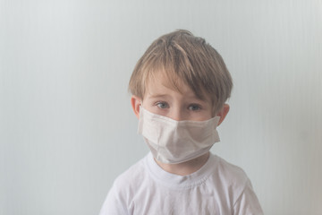 Portrait of the little boy looking in the camera