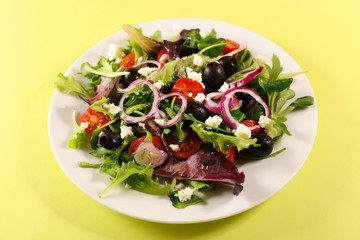 vegetable salad with olive, onion, tomato and feta cheese