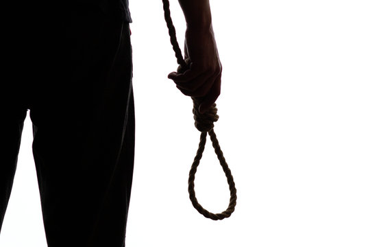 silhouette of a man figure with a rope noose in hand on a white isolated background, concept life failure, person going to commit suicide through hanging
