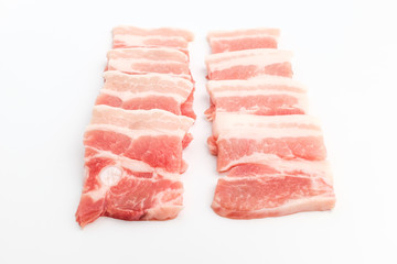 Sliced ​​pork belly on white background