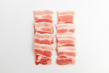 Sliced ​​pork belly on white background