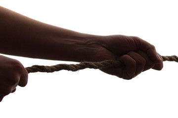 silhouette man hands pulling a rope tug of war on isolated white background, concept of leadership...
