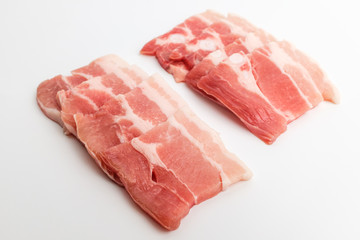 Sliced ​​pork belly on white background