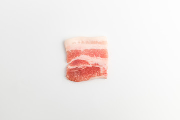 Sliced ​​pork belly on white background