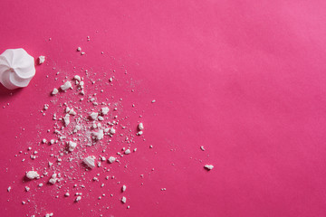 Fototapeta na wymiar Scattered crumbs isolated on pink background