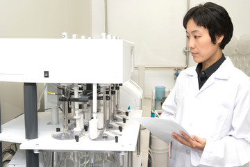 Pharmaceutical scientific female r at pharmacy industry manufacture factory laboratory