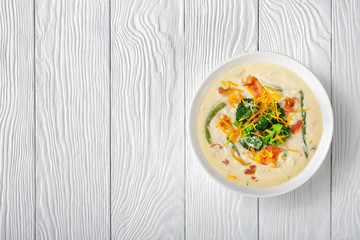 portion of cream soup with broccoli in a bowl