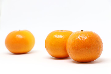 A group of Mandarin oranges isolated on white background